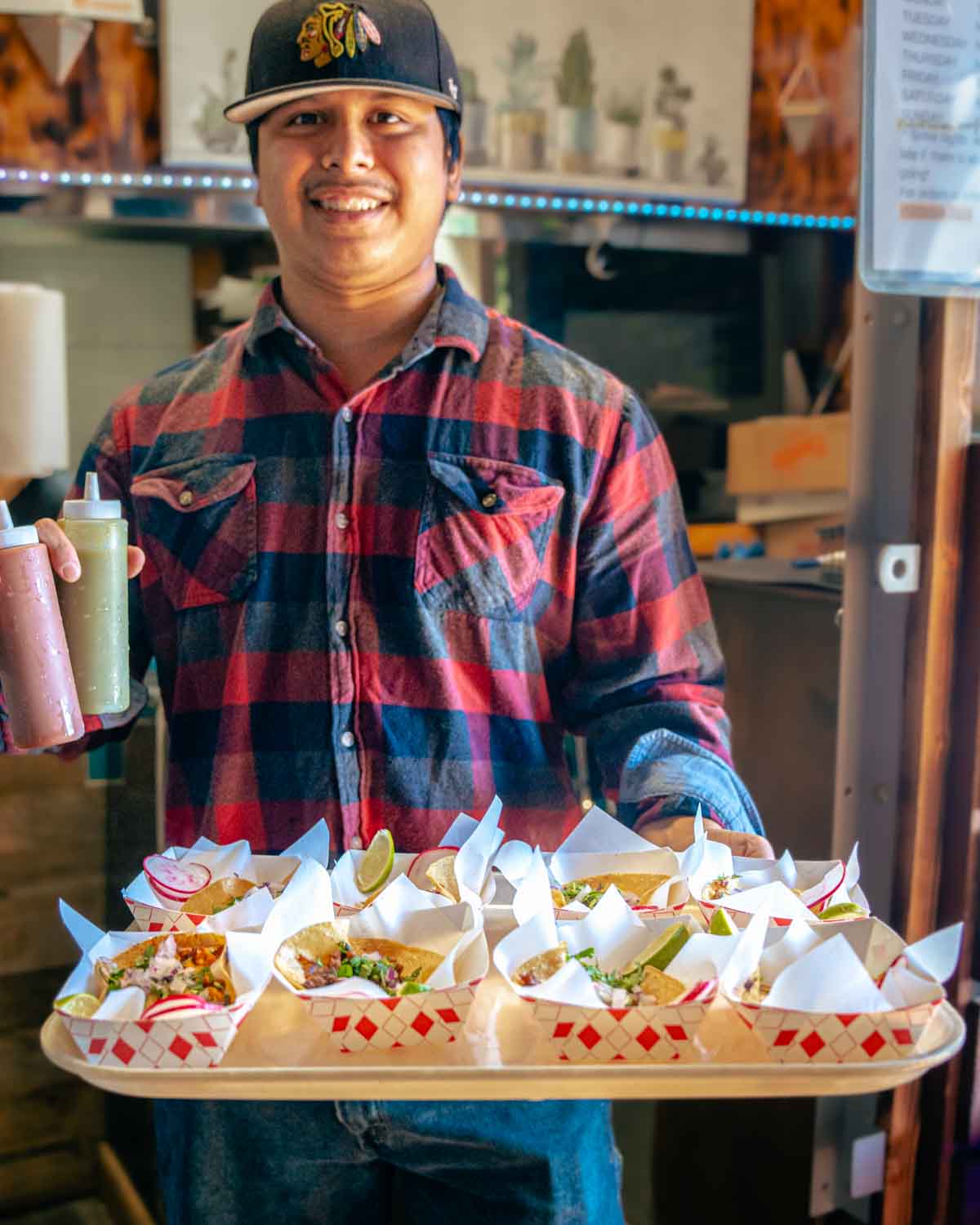 food cart vendor serving his food